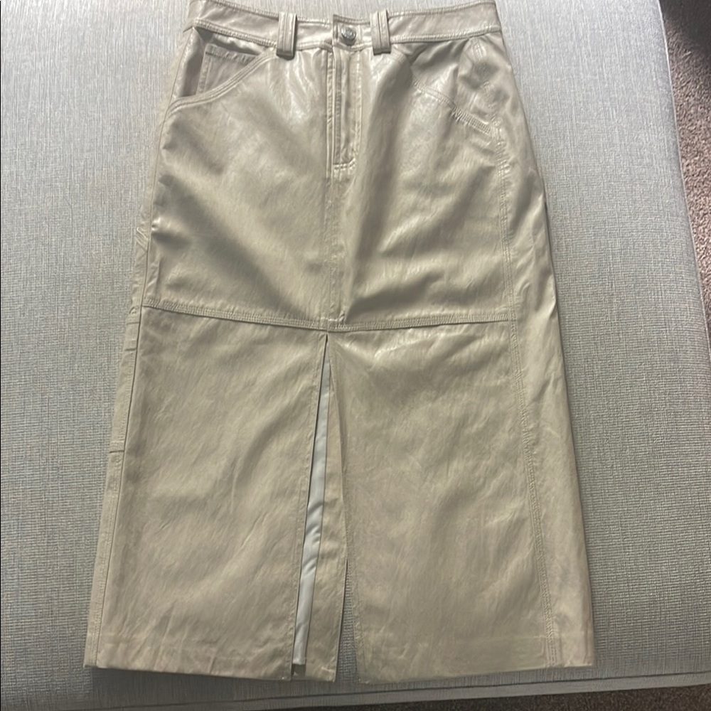 Brand new leather style midi skirt. Loved it but too big for me.